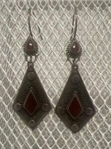 The earrings photo from back home reminds Rahima of her home.