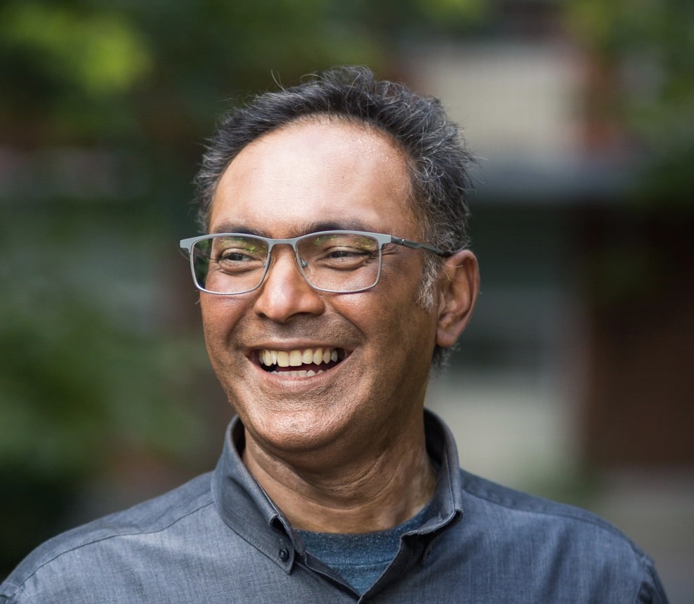 Darrell Pinto, Director of Employment at Jumpstart, smiling in a professional setting.