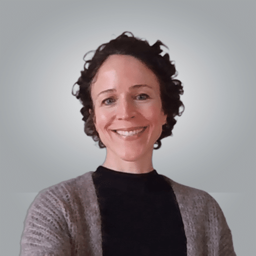 Portrait of Amanda Fortier, Communications Manager at Jumpstart, smiling confidently.