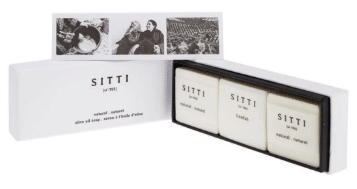 A Sitti gift box containing two original Sitti soap bars and one loofah soap bar arranged neatly together.
